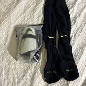 Adult shin guards and tall athletic socks